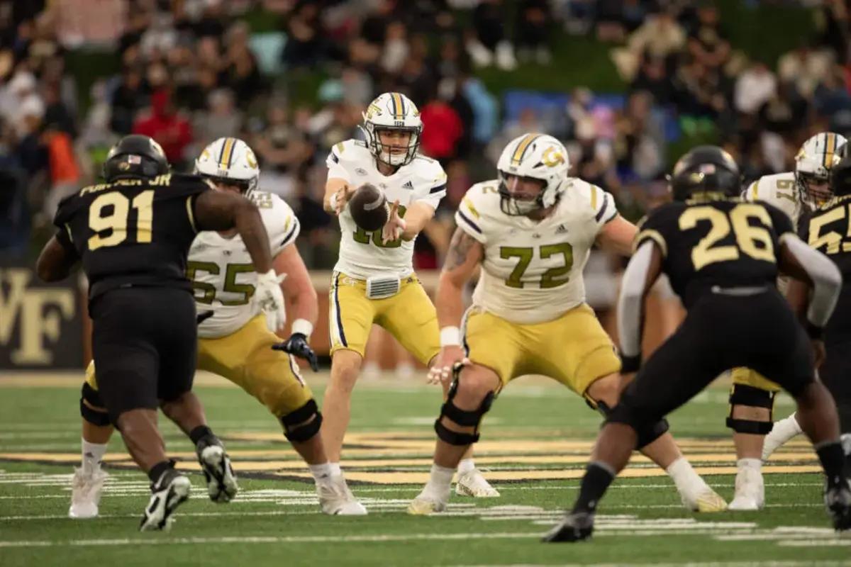 Connor Scaglione (#65) and Weston Franklin (#72) drop back into pass protection against Wake Forest.
